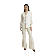 Cream-colored tailored blazer with single button closure and beige polyester elastane flared trousers from artigli women collection