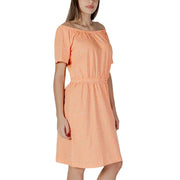 B.young orange soft peach off-the-shoulder dress with white dot pattern and gathered waist for stylish wear