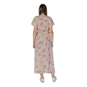 A flowing light pink floral maxi dress with short sleeves and matching belt made of 100% cotton by B.young