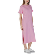 A soft pink short cotton dress by B.young with short sleeves round neckline and a side slit midi length