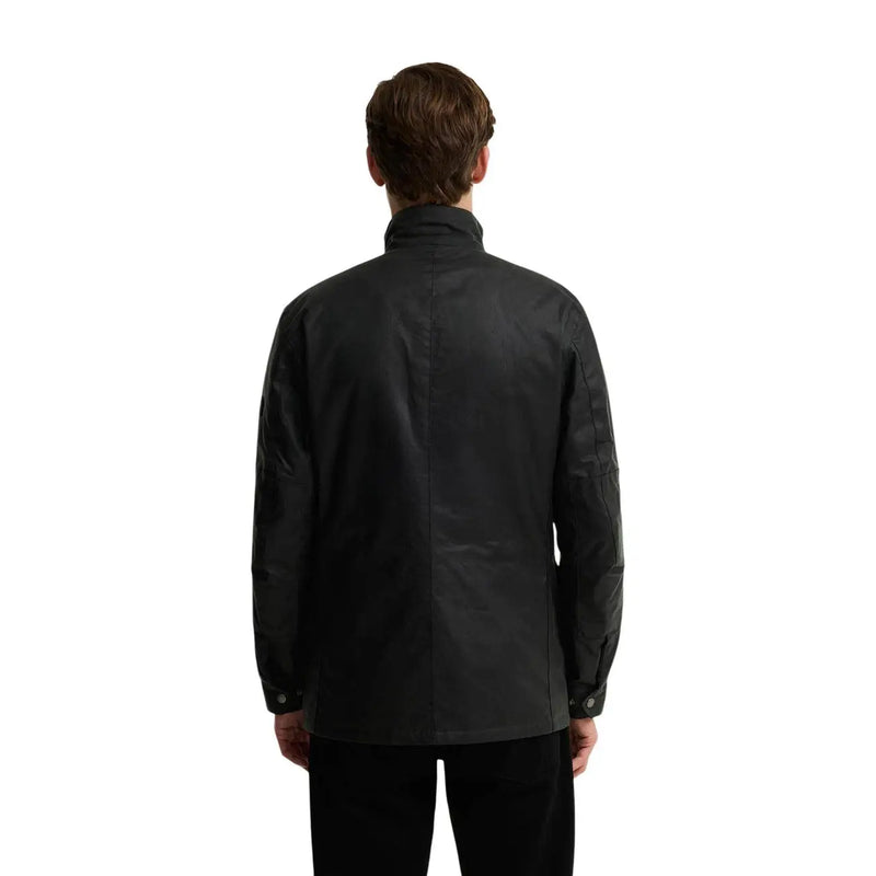 Grüne Baumwoll-Wachsjacke von Barbour International mit schwarzem Lederkragen und geknöpften Manschetten für Herren.