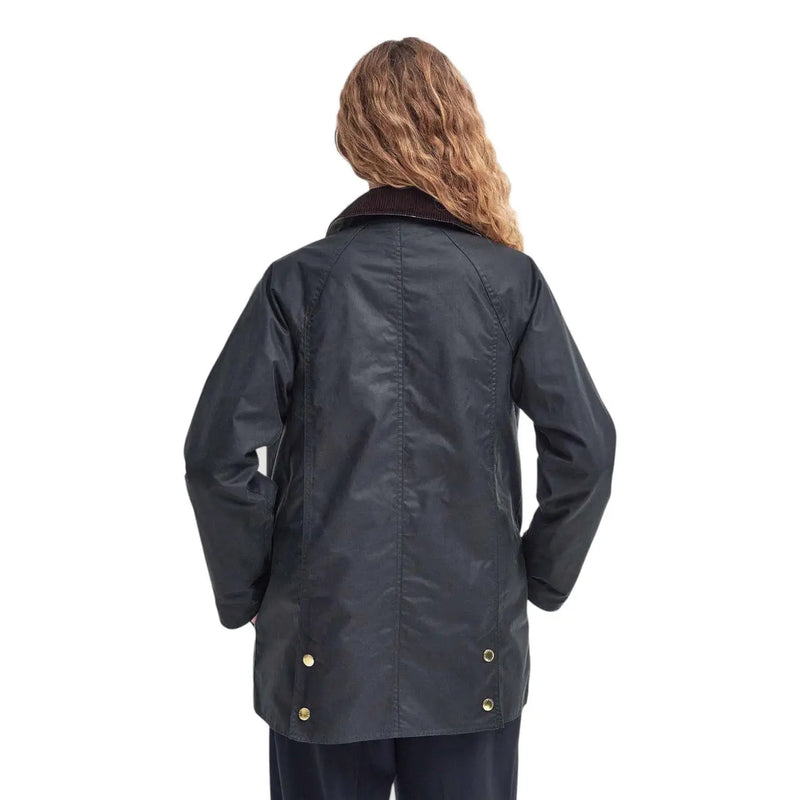 Barbour women wax blazer brown cotton jacket with dark navy waterproof fabric, brown corduroy collar, and brass buttons