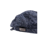 Casquette plate Barbour en laine pour homme, en tweed à chevrons gris foncé, avec étiquette en cuir, vue de face