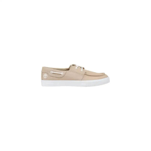 Beige boat shoe with white sole and white laces for casual footwear style
