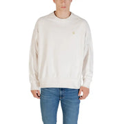 Beige crewneck sweatshirt in cream color with subtle gold embroidered calvin klein logo on the chest