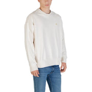 Beige crewneck sweatshirt made of cream-colored fabric featuring a subtle gold Calvin Klein logo on the chest