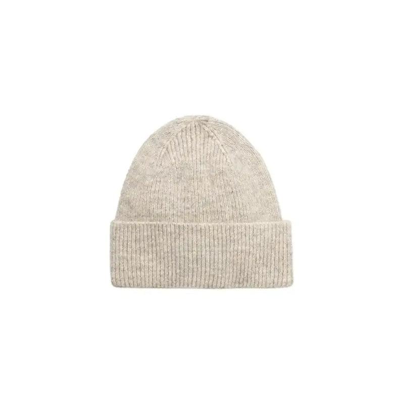 Beige knitted beanie featuring a stylish black patch for casual wear