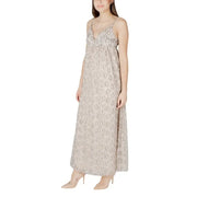 Beige patterned sleeveless maxi dress displayed on a model for elegant summer wear