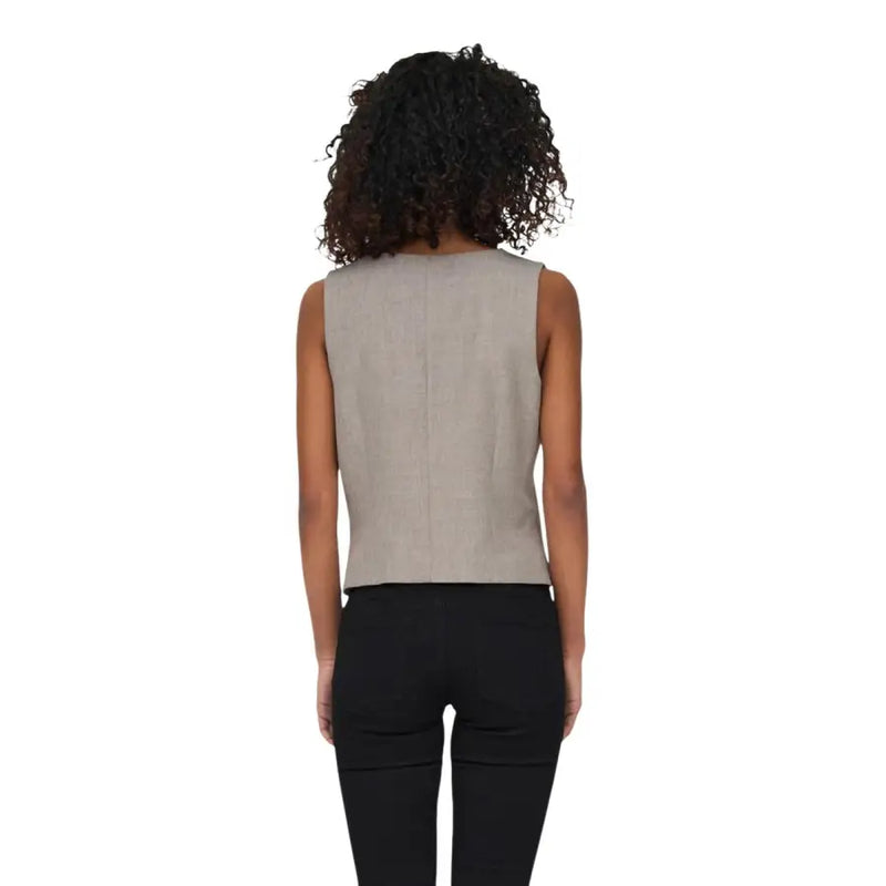 Beige sleeveless v neck gilet for women in light gray linen with subtle texture and straight hemline front view