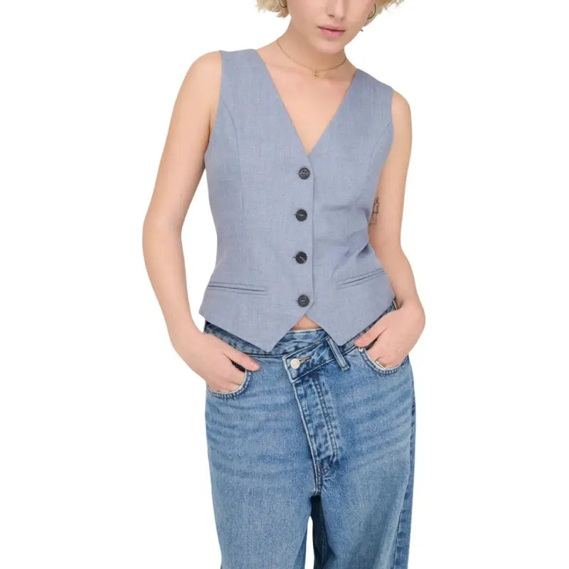 Light blue sleeveless v neck gilet for women with dark buttons