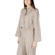 Beige viscose long sleeve cropped shirt with collar and button closure for women in a formal style