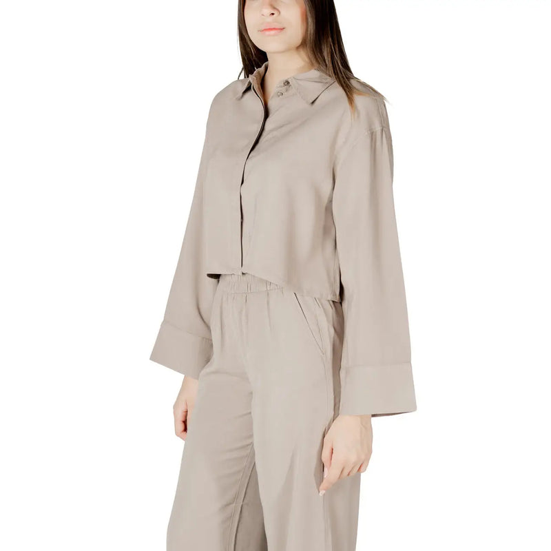 Beige viscose long sleeve cropped shirt with collar and button closure for women in a formal style