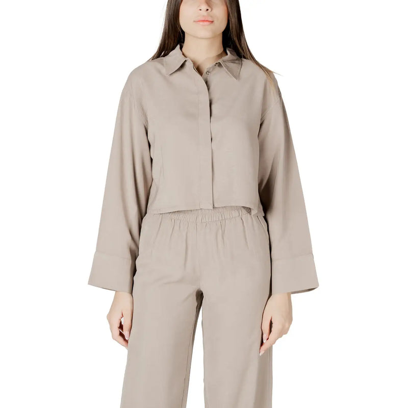 Beige viscose long sleeve round neck blouse for women with relaxed fit button-up design and pleated cuffs
