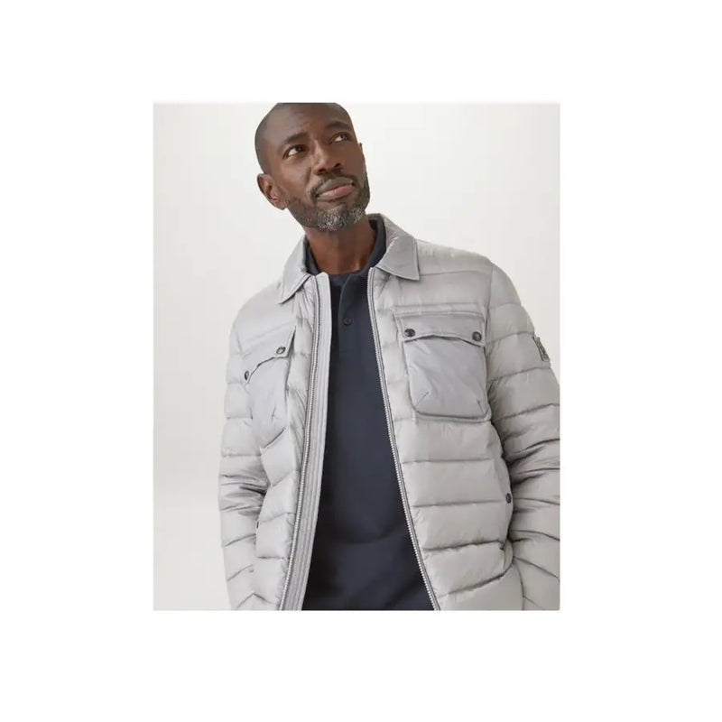 Belstaff men long sleeve cotton polo blue paired with light gray quilted puffer jacket with structured collar and flap pockets