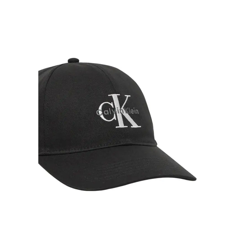 Black Calvin Klein baseball cap displayed prominently in the product listing