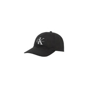 Black Calvin Klein baseball cap displayed in the product image for fashionable headwear