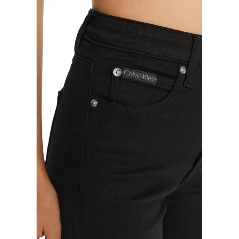 Black Calvin Klein high waisted skinny jeans displayed in a product image