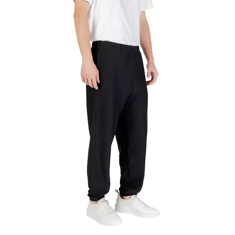 Schwarz Calvin Klein Schwarze Jogginghose mit schmal zulaufendem Bein, elastischen Bündchen und lockerer Passform
