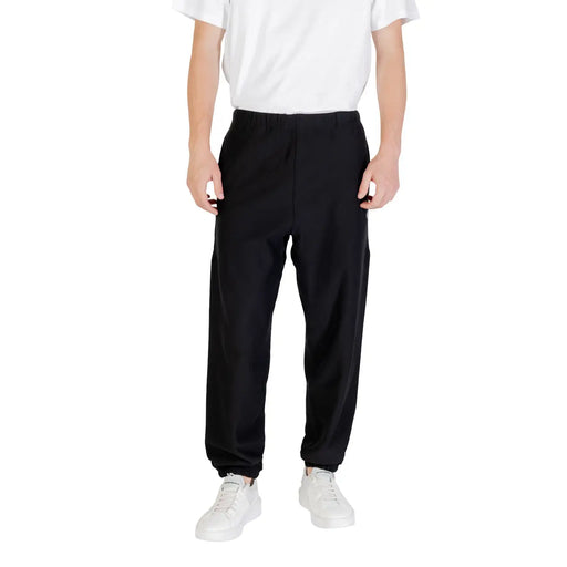 Black Calvin Klein slim-fit jogger pants with elastic cuffs and relaxed silhouette in soft fabric