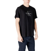Black Calvin Klein t shirt in cotton with a subtle gray ck logo and brand name printed on the chest