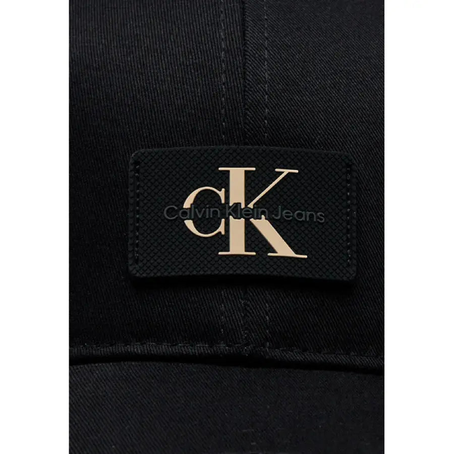 Calvin Klein black cap with K logo - urban style clothing accessory on white background