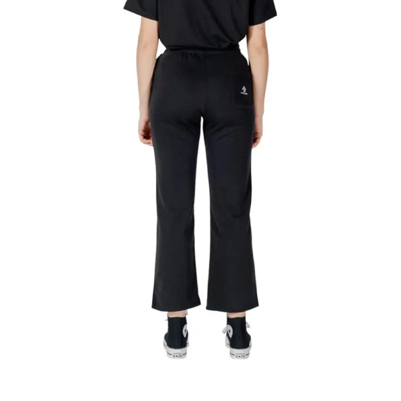 Black Cropped Flare Pants displayed with stylish Black Converse footwear