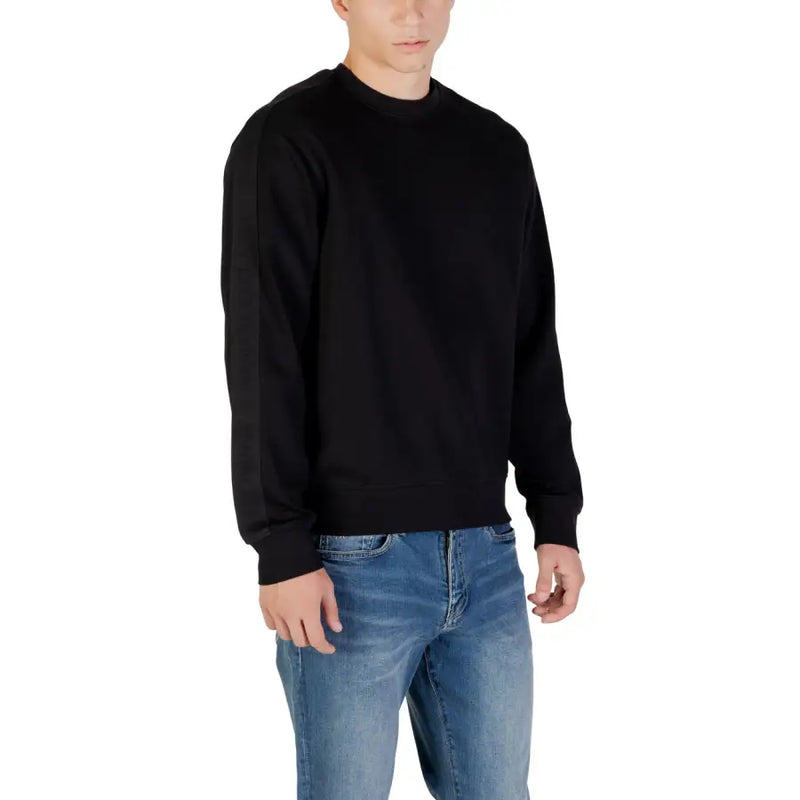 Black crewneck sweatshirt displayed in the product lineup for casual and comfortable wear