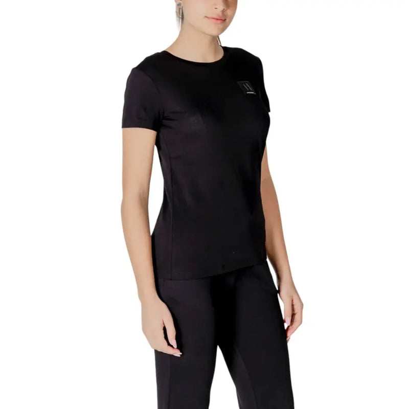 Black crewneck t shirt featuring a black short-sleeved design with a subtle logo on the left chest