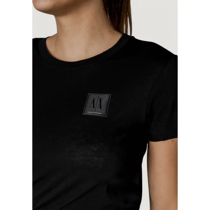 Black armani exchange crewneck t shirt featuring a subtle matte finish logo patch on the chest