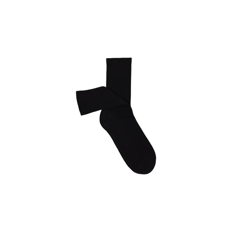 A sleek black Guess crew sock with a smooth solid finish ideal for comfortable everyday wear