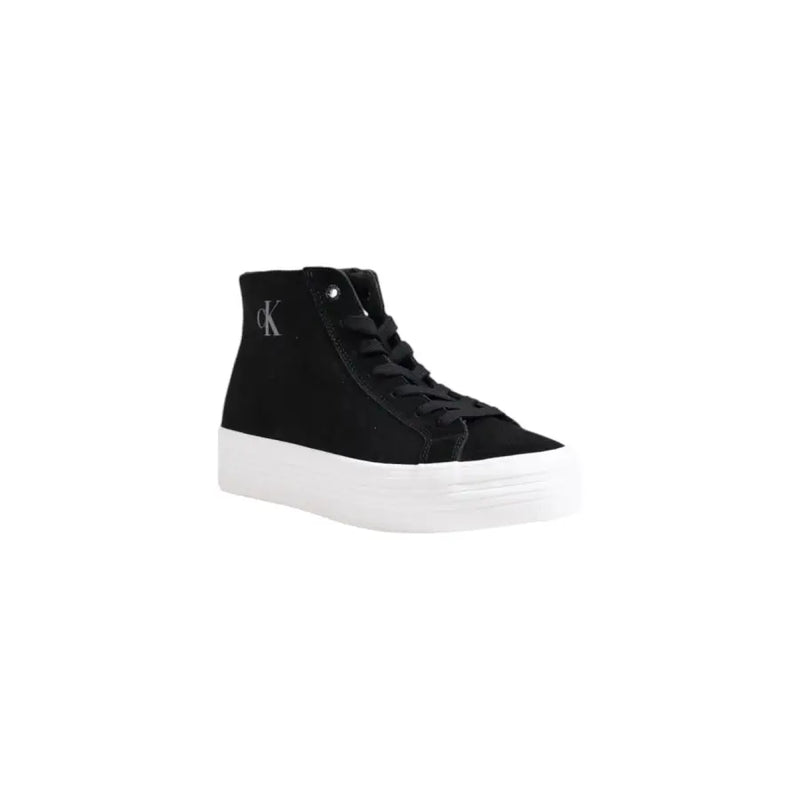 Black high top sneaker with white platform sole and silver Calvin Klein logo on the side made of leather