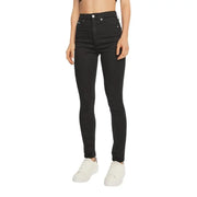 Calvin Klein black high-waisted skinny jeans displayed on a model
