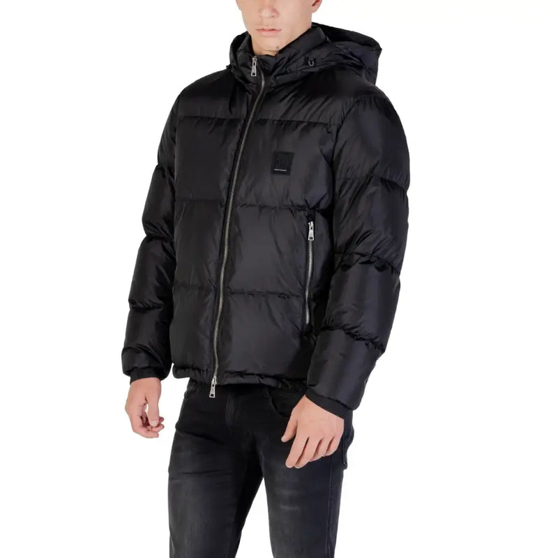 Black hooded puffer jacket with quilted design, silver zippers, and insulated material for cold weather use