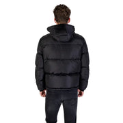 Black hooded puffer jacket with quilted design and hood made from insulated material for cold weather use