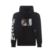 Black hooded sweatshirt featuring a rectangular photographic print on the chest and white graphic lettering on the sleeve