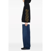 Black hoodie with yellow accents featuring gold geometric embroidery along the sleeve in cotton material