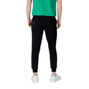 Black jogger pants with white drawstring and ICON print for a casual athletic look