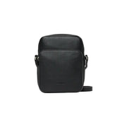 Black leather crossbody bag displayed in a product image showcasing stylish sophistication