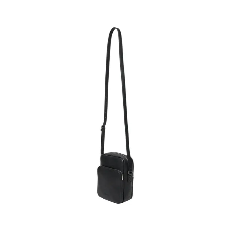 Black leather crossbody bag displayed against a neutral background showcasing elegant design
