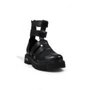 Black leather gladiator style platform boot displayed in a product image