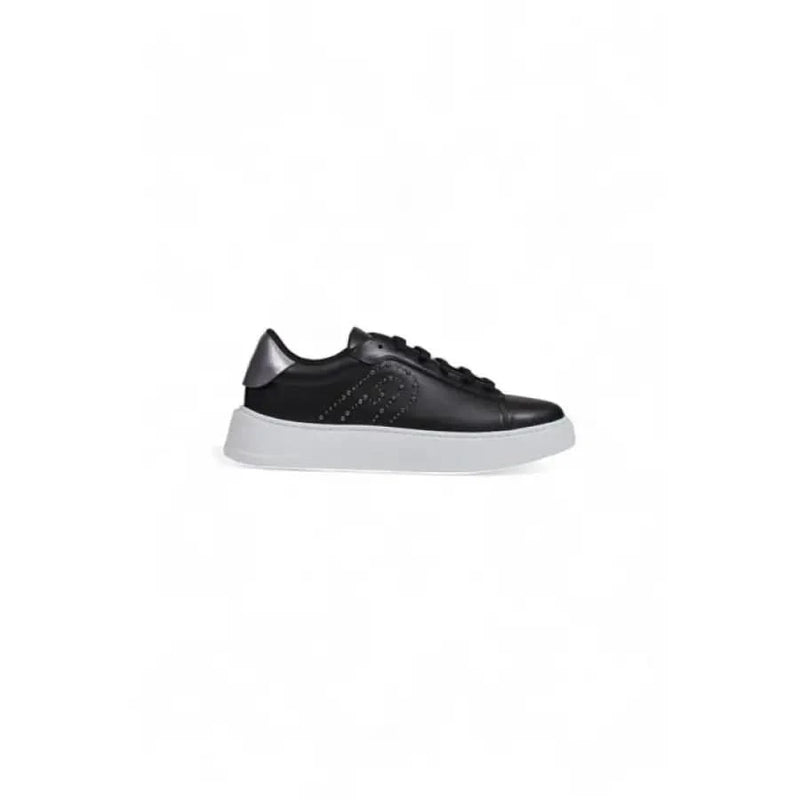Black leather sneaker with white sole from Furla Women’s collection