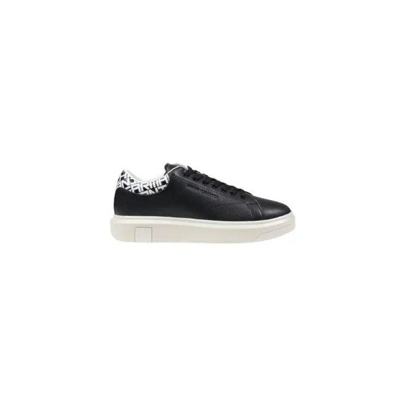 Black leather sneaker with white sole and patterned heel for stylish comfort