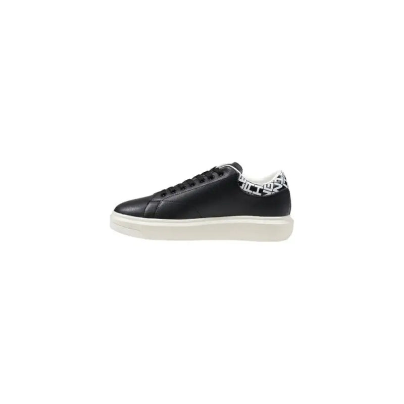 Black leather sneaker with patterned heel and white sole, stylish footwear for men