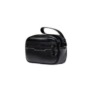 Black leather toiletry and wristlet bag for elegant travel organization