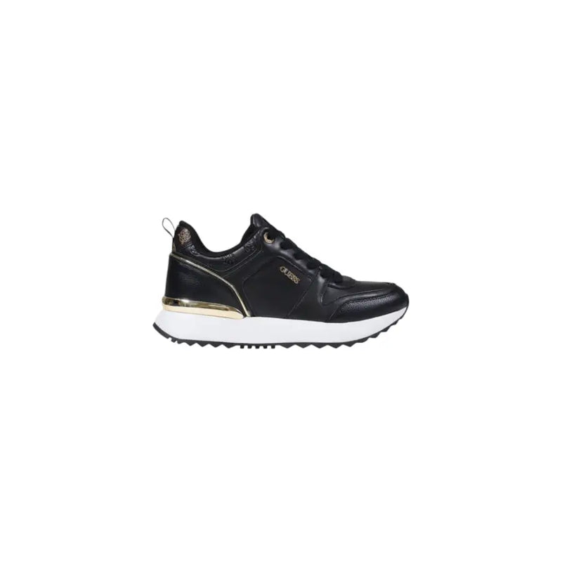 Black leather women’s slip-on sneakers with gold accents and white soles for Guess Fall Winter collection