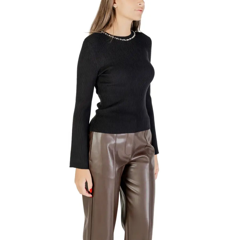 Black ribbed long-sleeve women’s sweater with pearl and rhinestone-embellished neckline