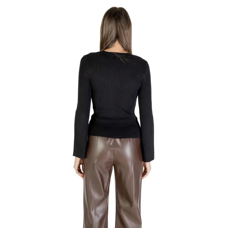 Black ribbed knit long-sleeve top with round neck and rhinestones for women in a classic sweater style