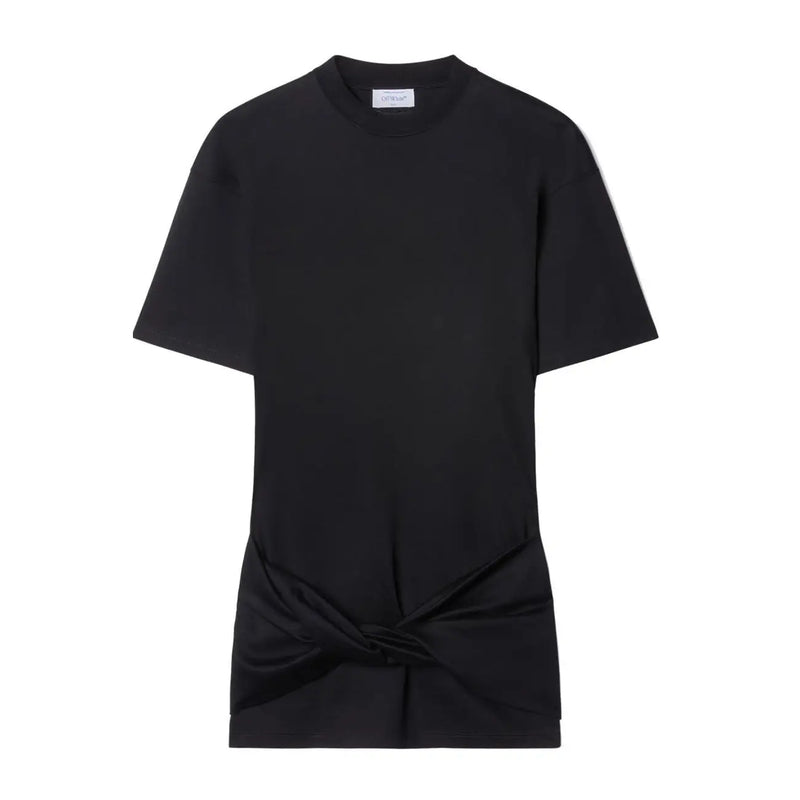 Black short-sleeved t-shirt with knotted hem detail styled with black mini dress and sculptural heels