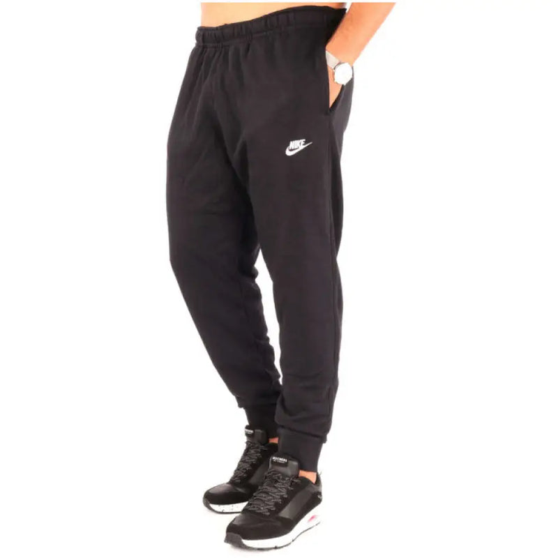 Black Nike Men All Seasons Trousers showcasing sleek athletic design and comfort