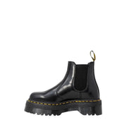 Black leather platform Chelsea boot displayed in a stylish footwear product image